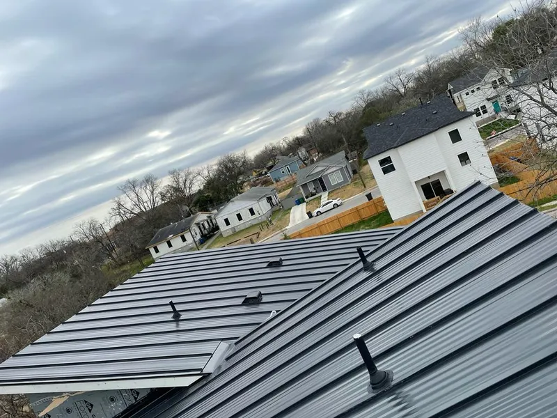 Standing seam metal roof panels with vents for Skylight Repair in Bellefontaine Neighbors